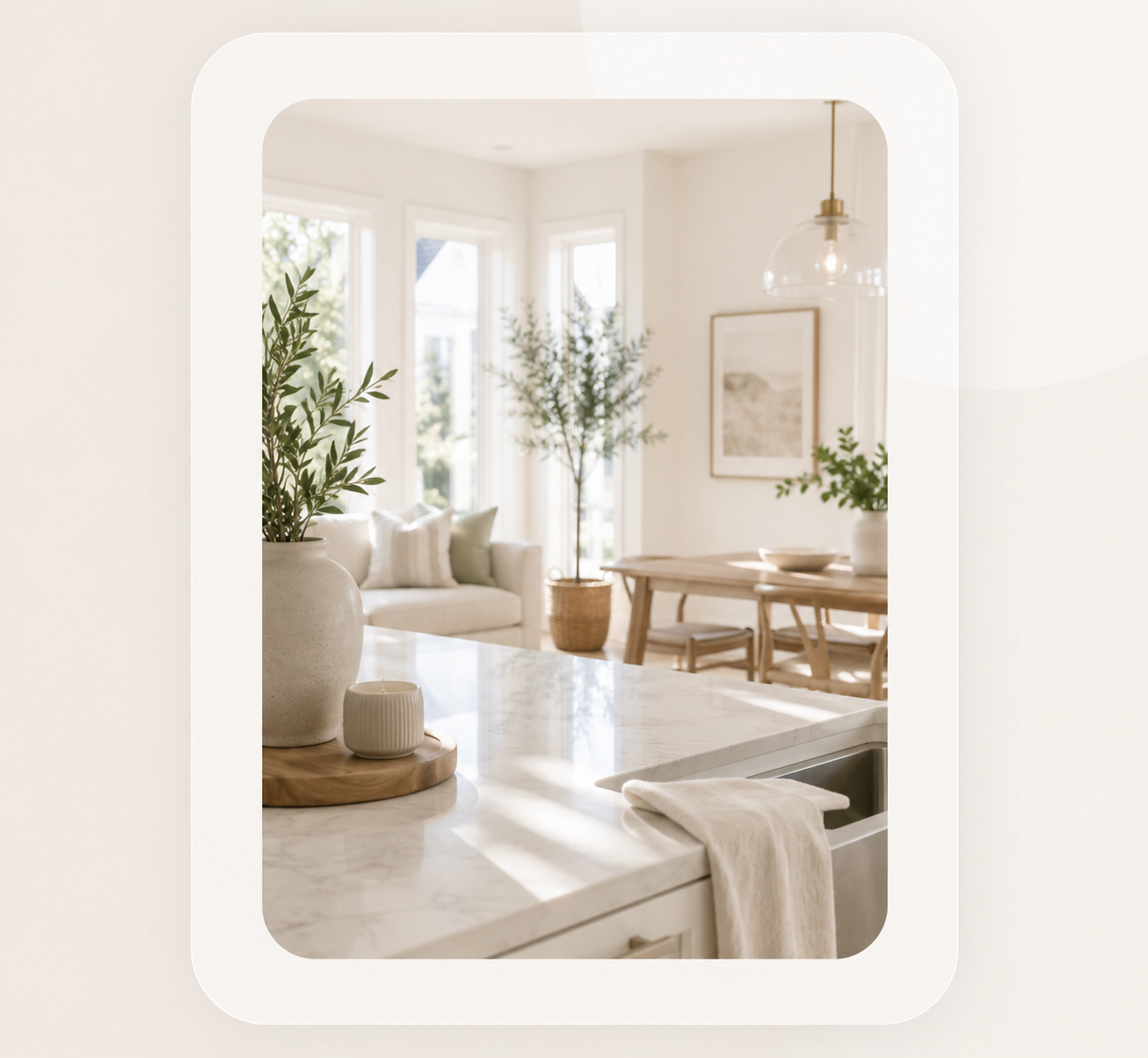 Bright, clean home interior with natural light, greenery, and a tidy kitchen and dining area